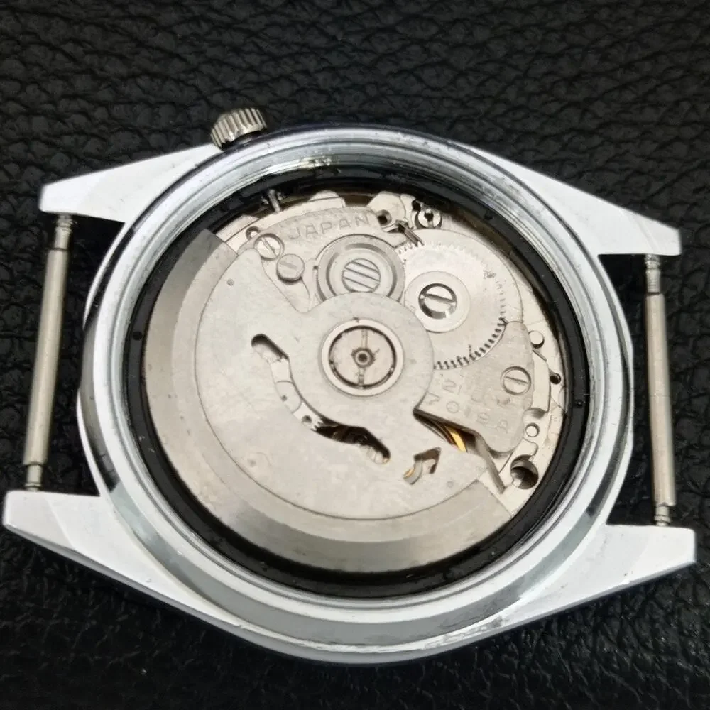 Vintage 1981 Seiko Automatic Mens Silver Watch W/daydate & White accents